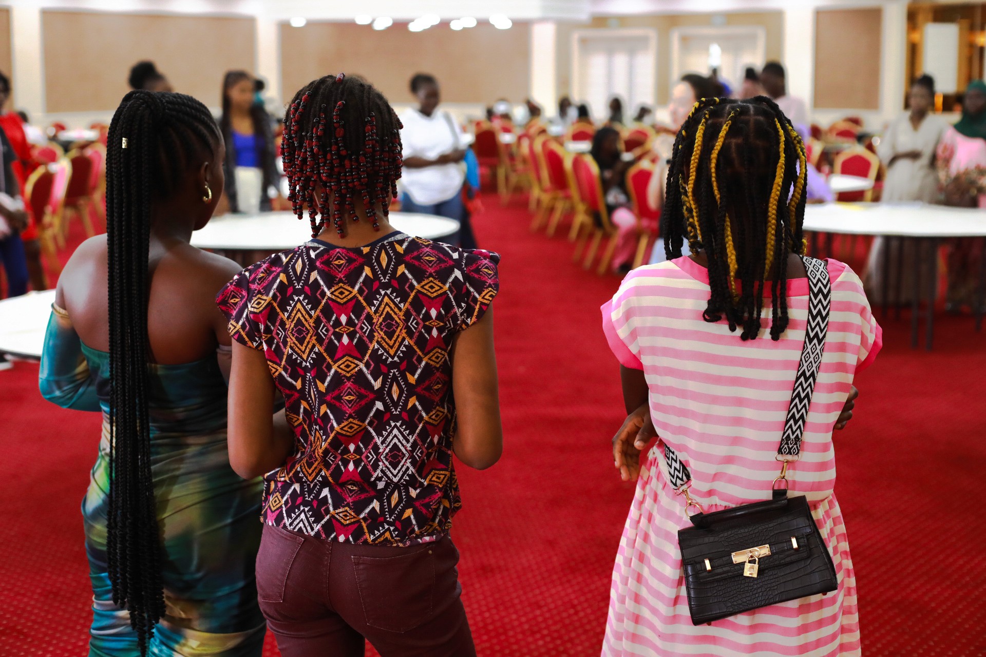 man in white button up shirt holding white smartphone