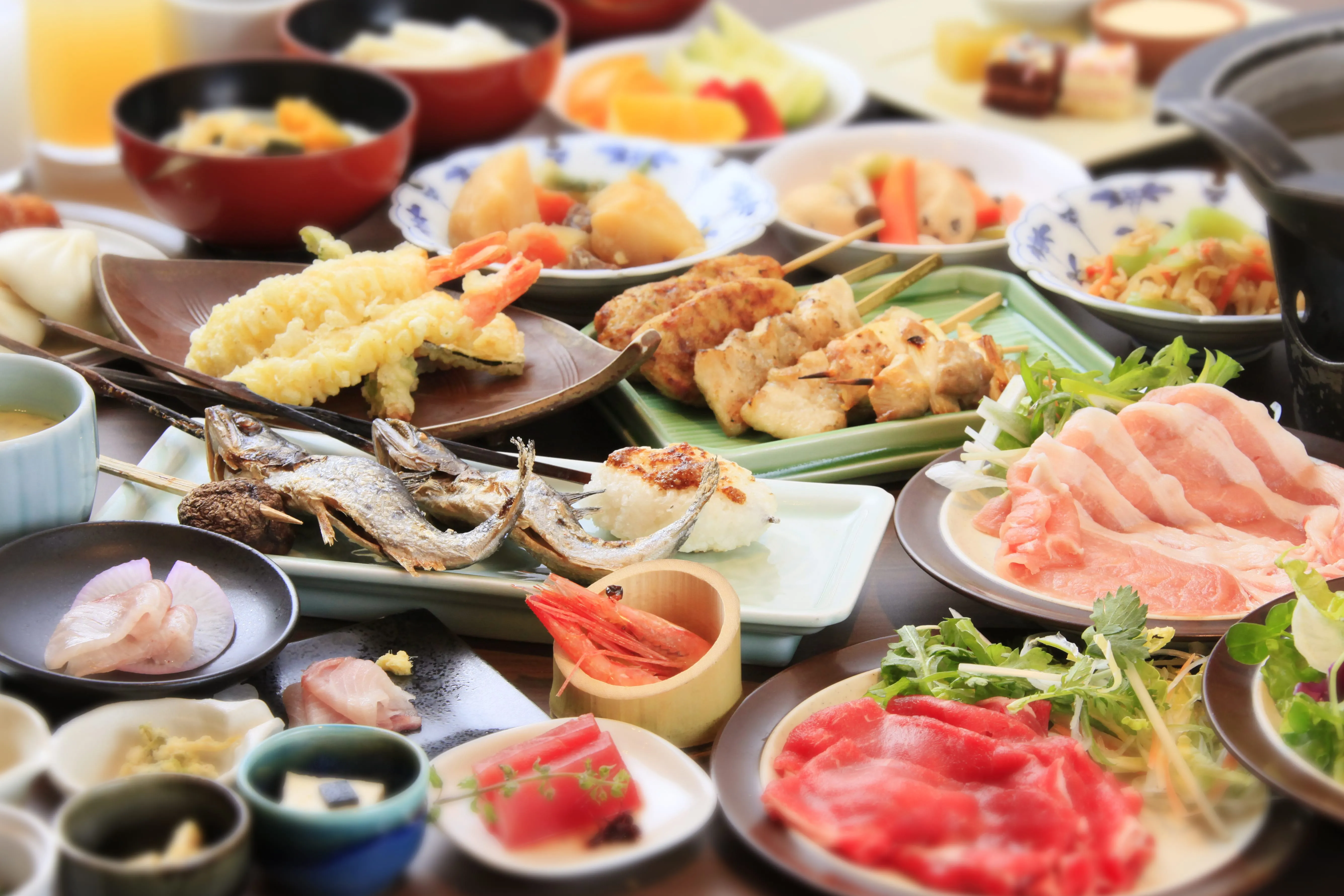 A joyful farmer in a black beanie and jacket stands in a golden field, smiling as he holds a large armful of freshly harvested rice stalks.