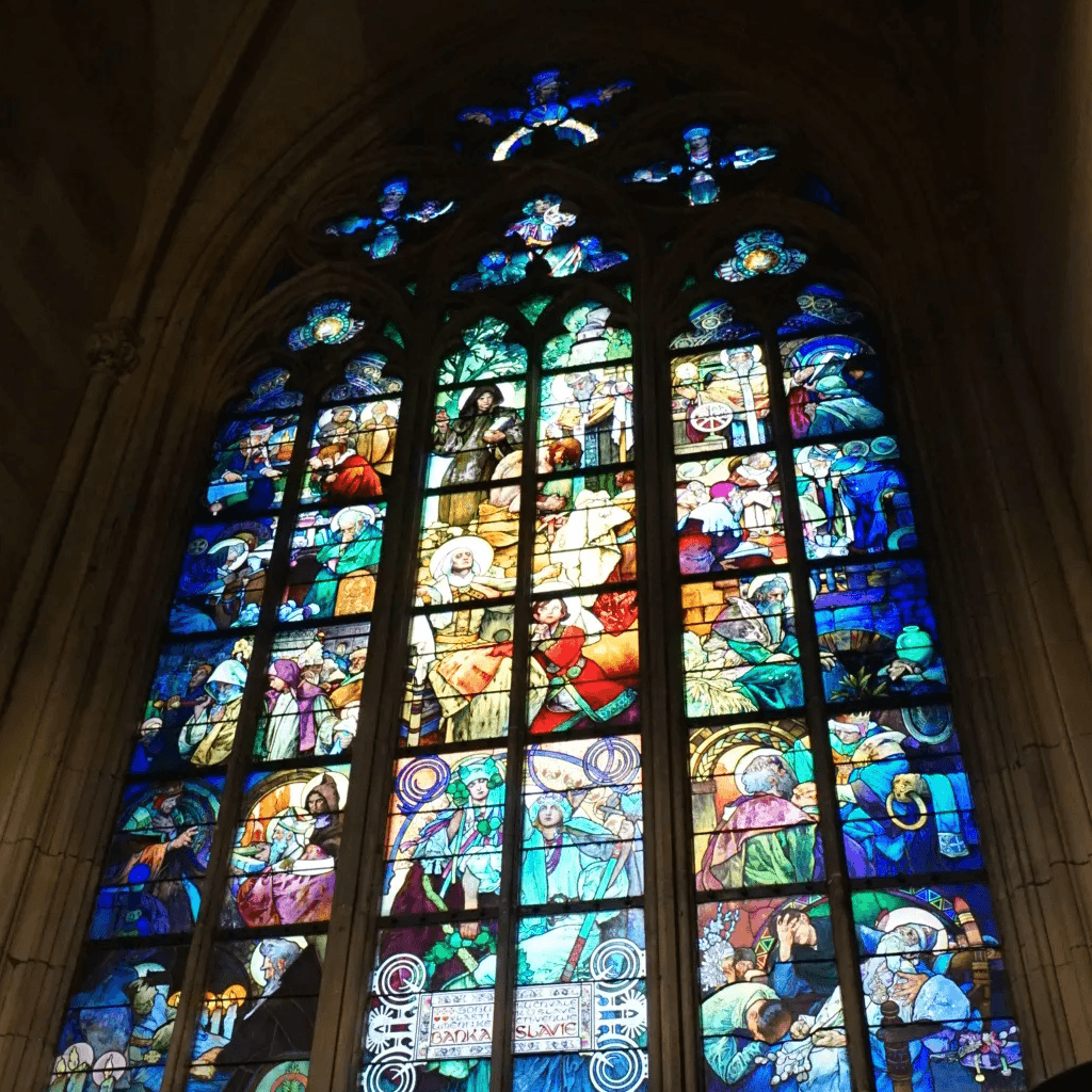 A shot of tainted glass depicting the story of Jesus in a church