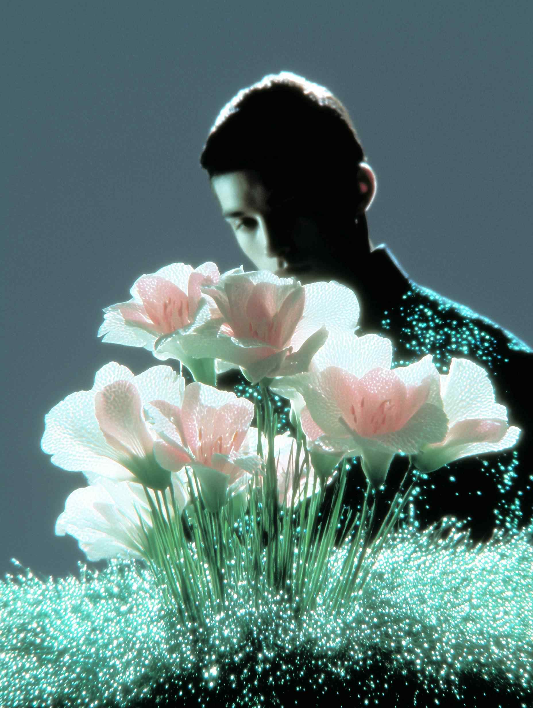 Profile portrait with blooming flowers