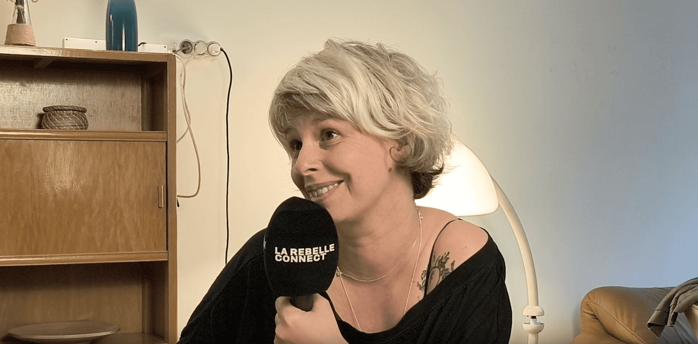 Athletes resting on a track after training.