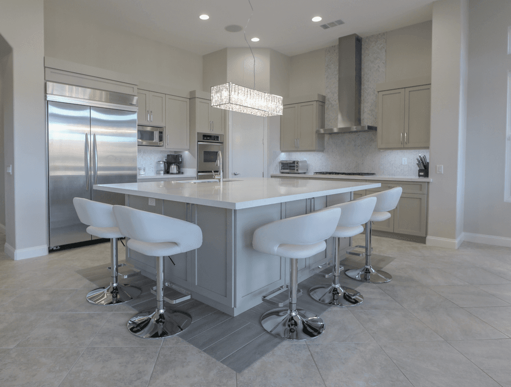 grey custom shaker kitchen cabinetry with big island