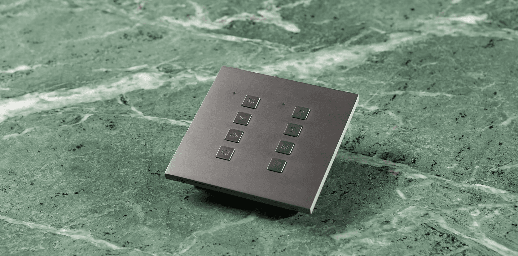 Electronic control panel with buttons on marble surface