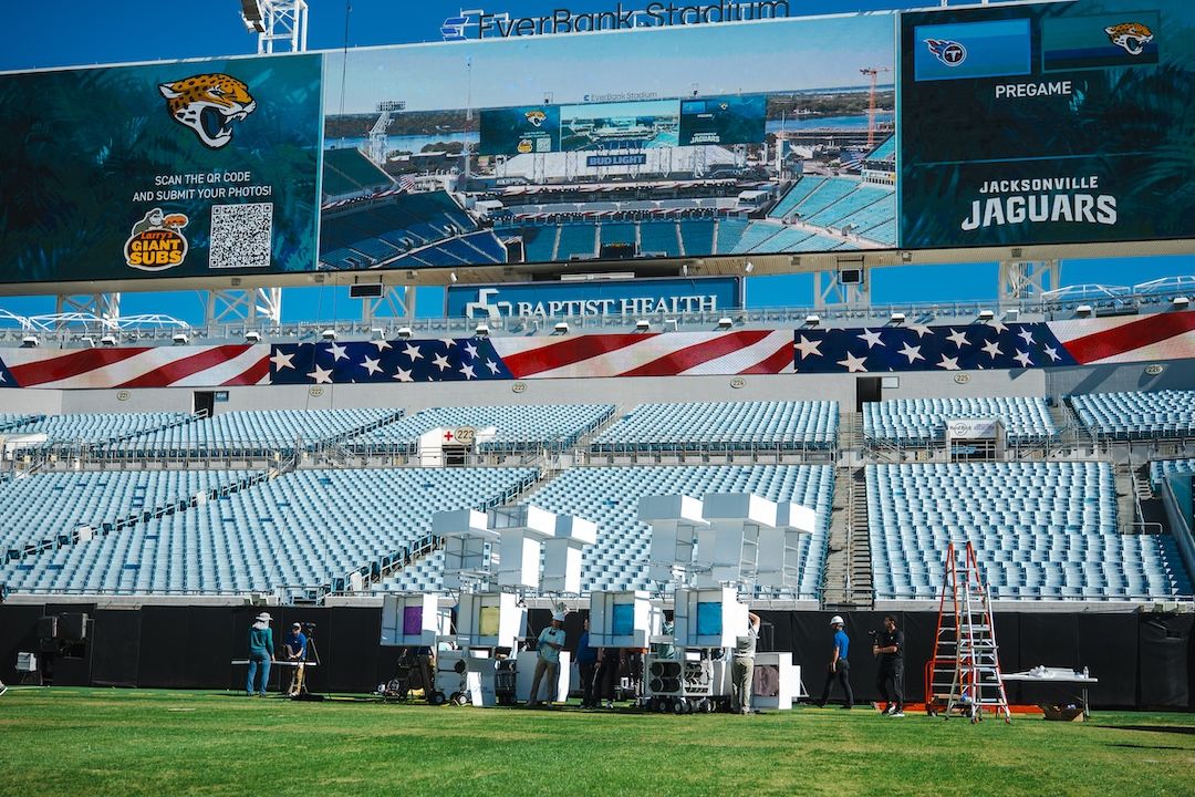 Star Catcher team setting up sunlight collection, concentration, and transmission ground test system at EverBank Stadium