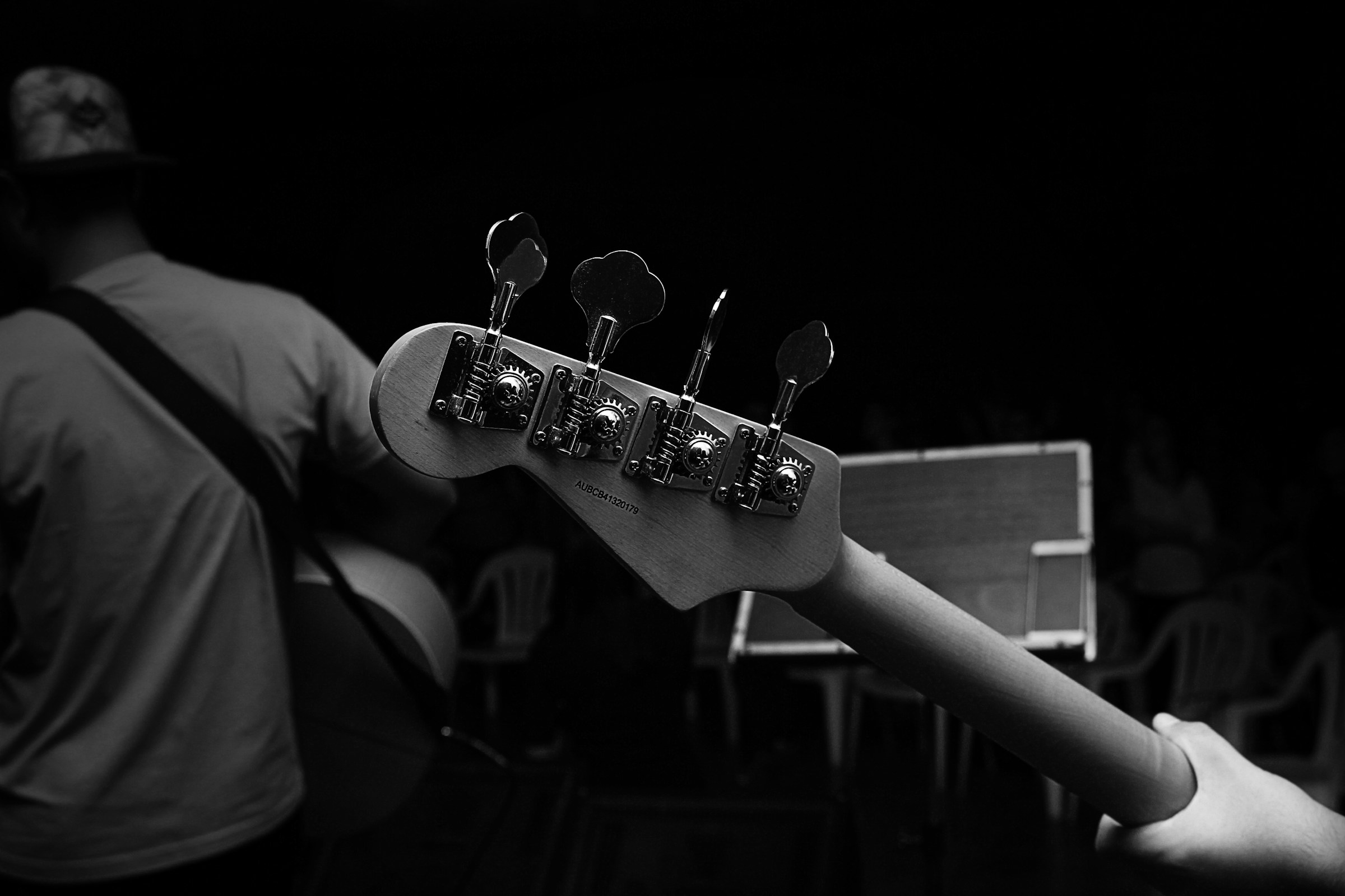 a bass guitar - What Instruments Are Used In Rap
