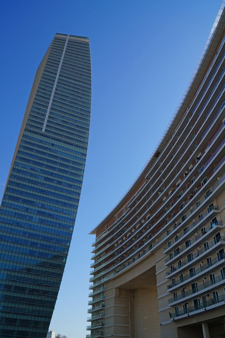 Architectural harmony: U-Bora residential & commercial towers in Business Bay, managed by top real estate specialists.