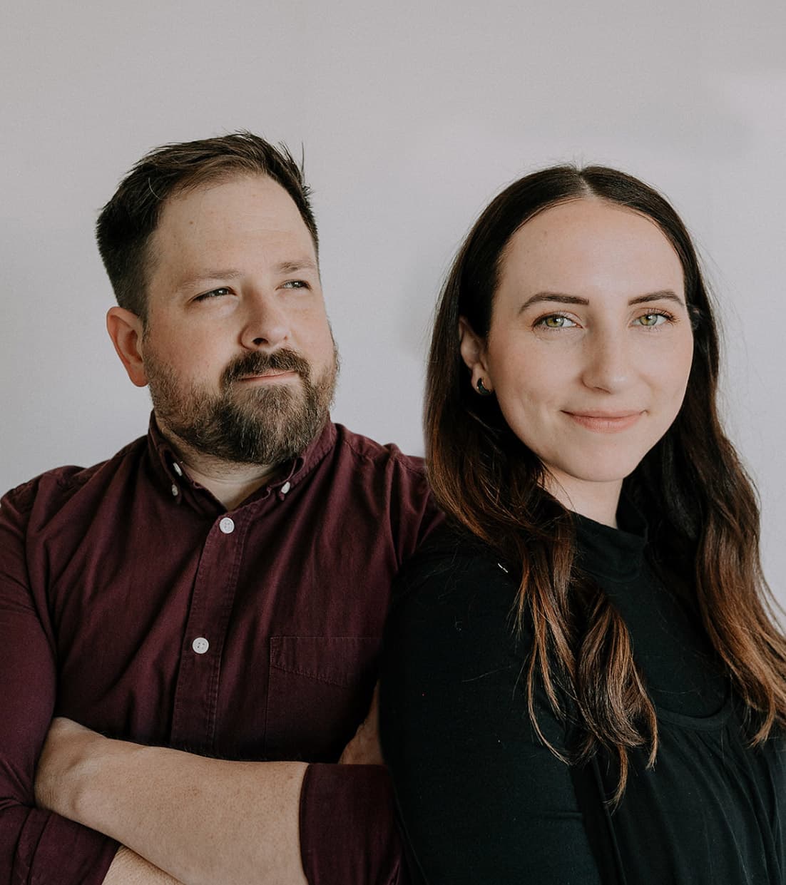 Andy and Brittney Roberts pose together at Revelator Studio, a natural light photography studio in Shreveport, ideal for creative collaborations and professional photo shoots.