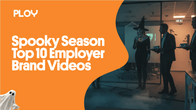 An orange PLOY graphic with the headline ‘Spooky Season — Top 10 Employer Brand Videos.’ On the right, a dimly lit office shows employees celebrating Halloween—one wearing a witch hat—walking through blue fog, with a small ghost illustration at the bottom left