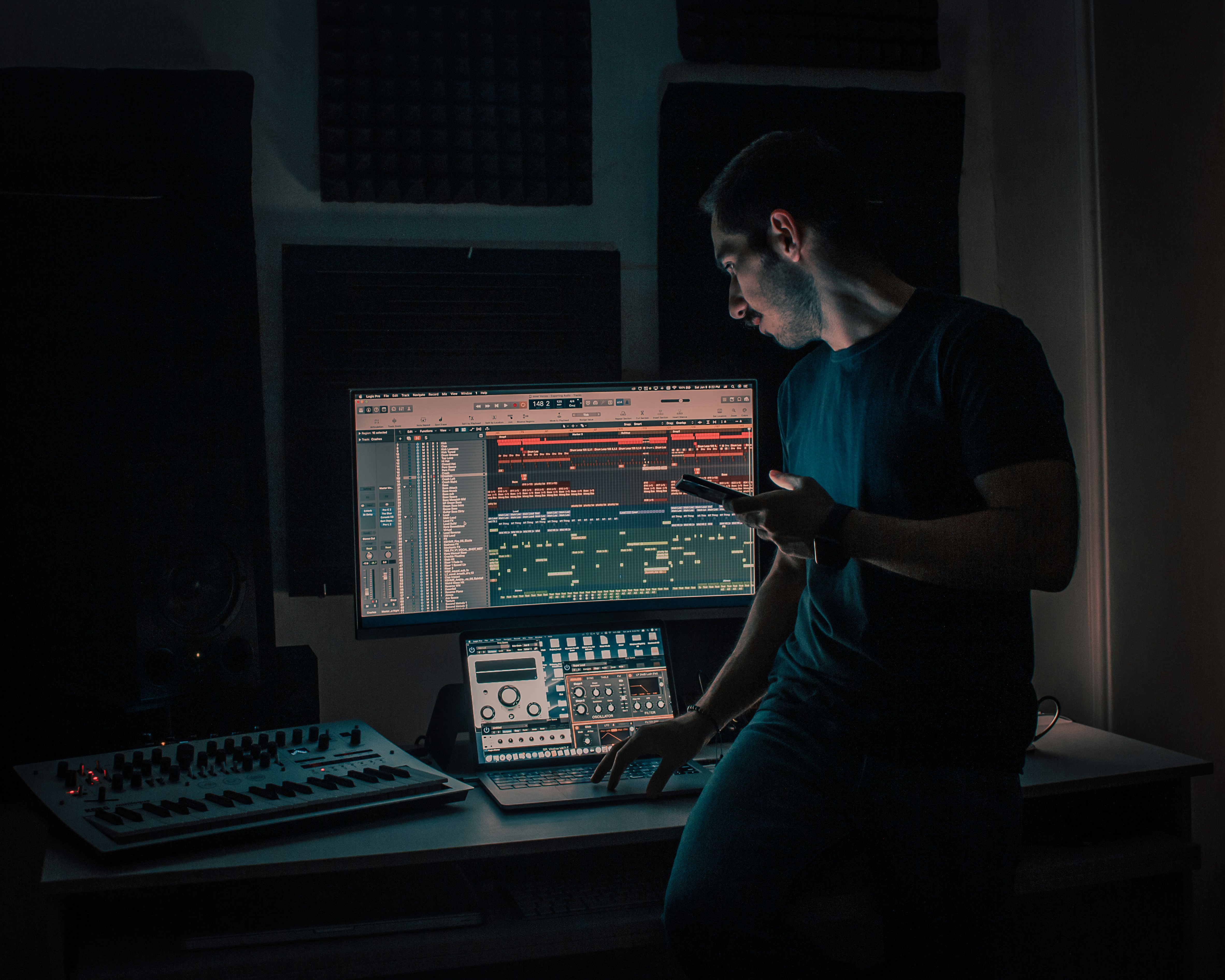 man in his studio table to record your own music