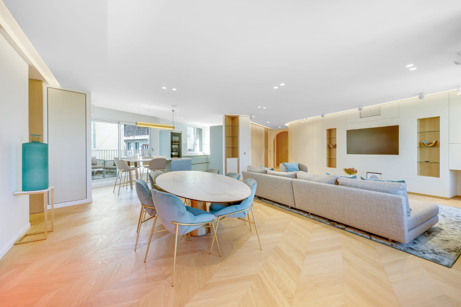 gray fabric loveseat near brown wooden table