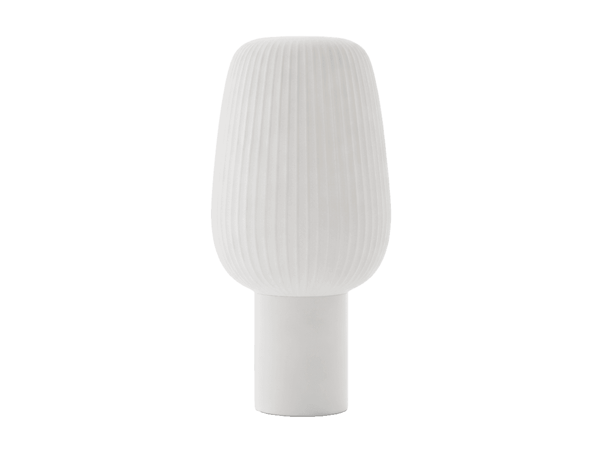 Unlit white ribbed lamp isolated against a plain background.
