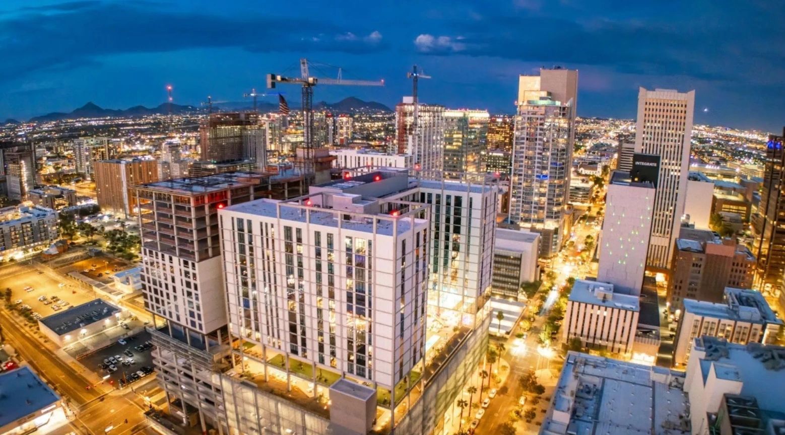 a black and white living room with a large tv