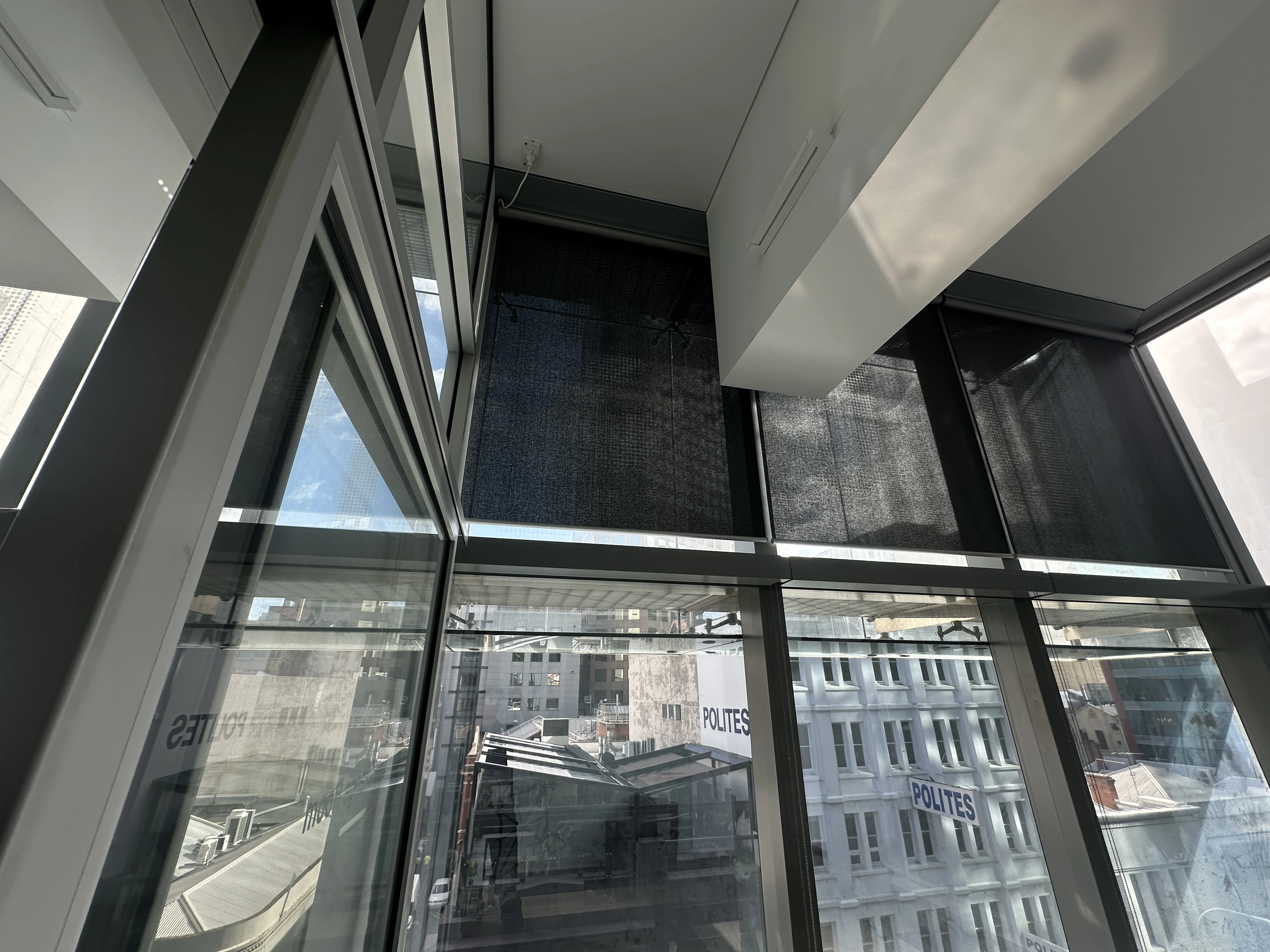 Blockout roller blinds installed inside The Advertiser Building office space