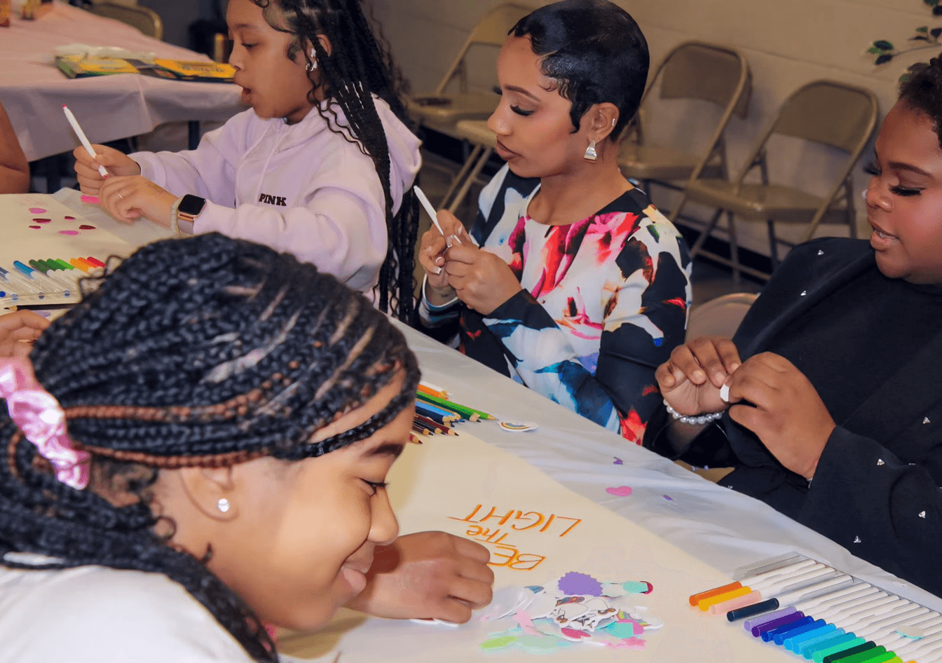man drawing on dry-erase board