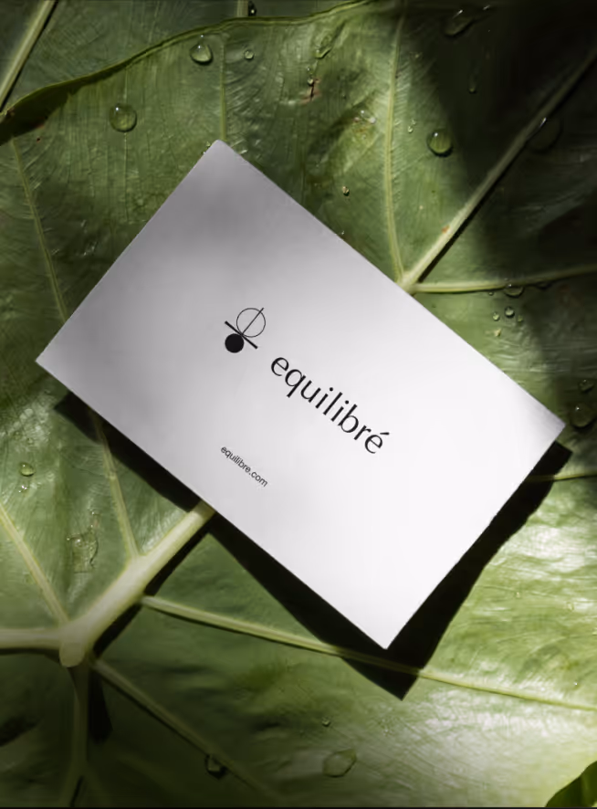 White business card with the text