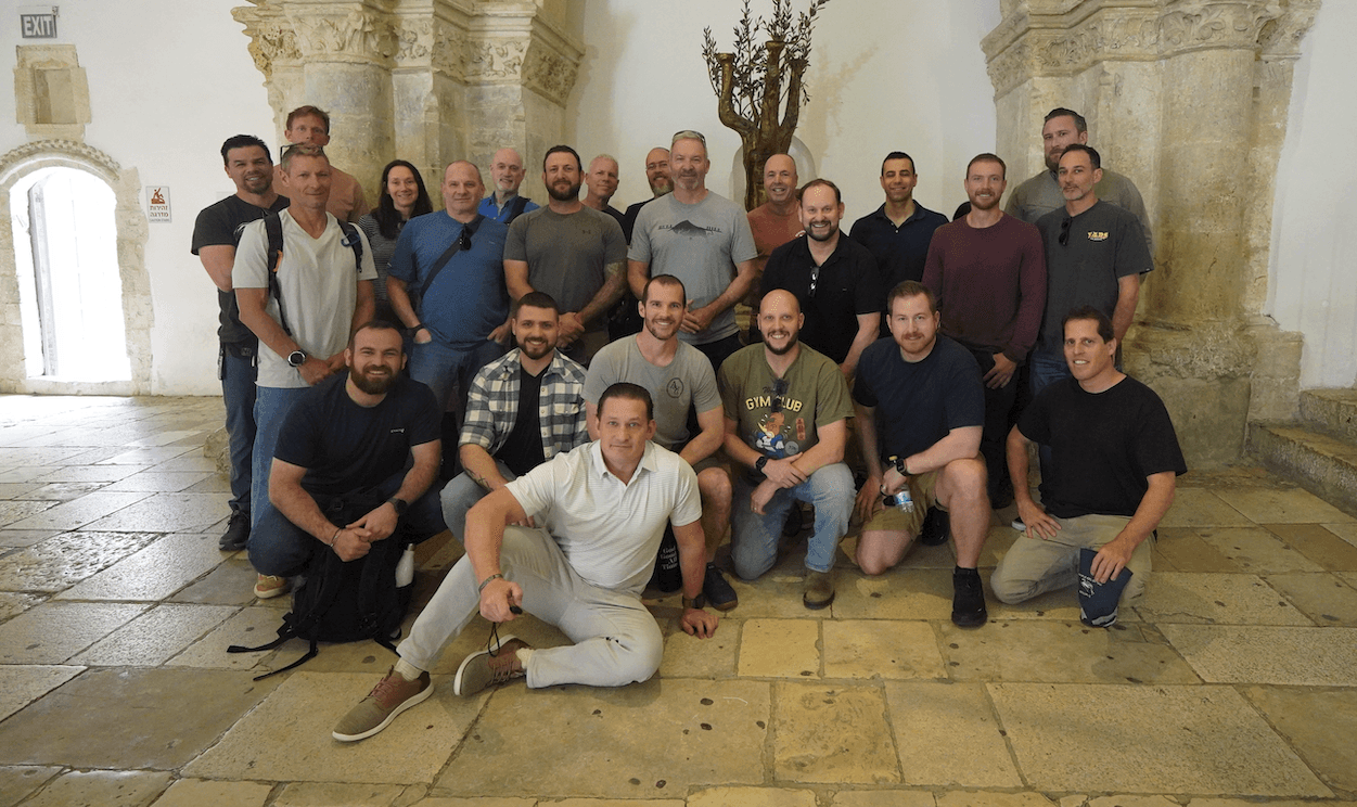 person holding orange flower petals