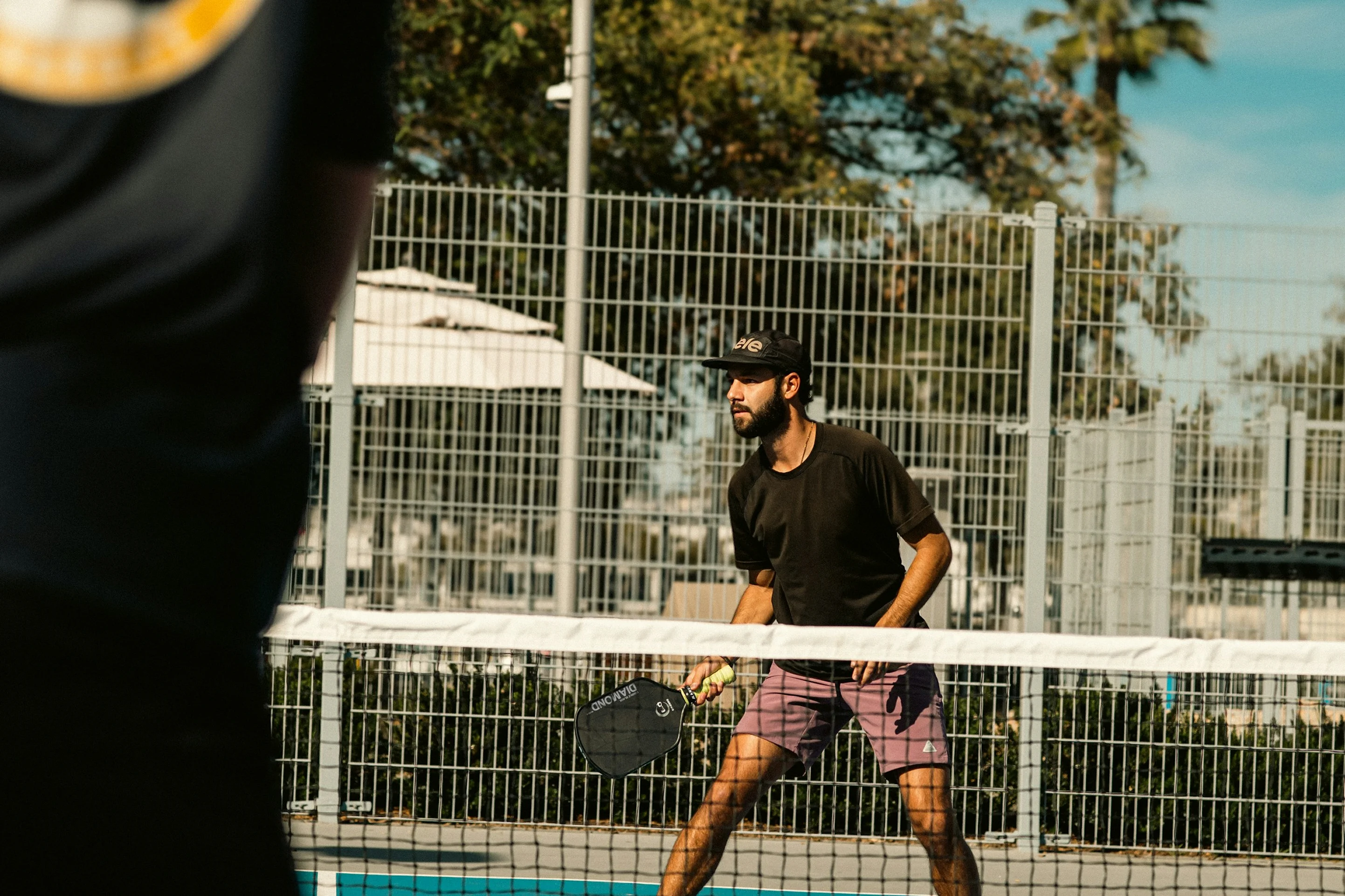 Pickleball player at the net