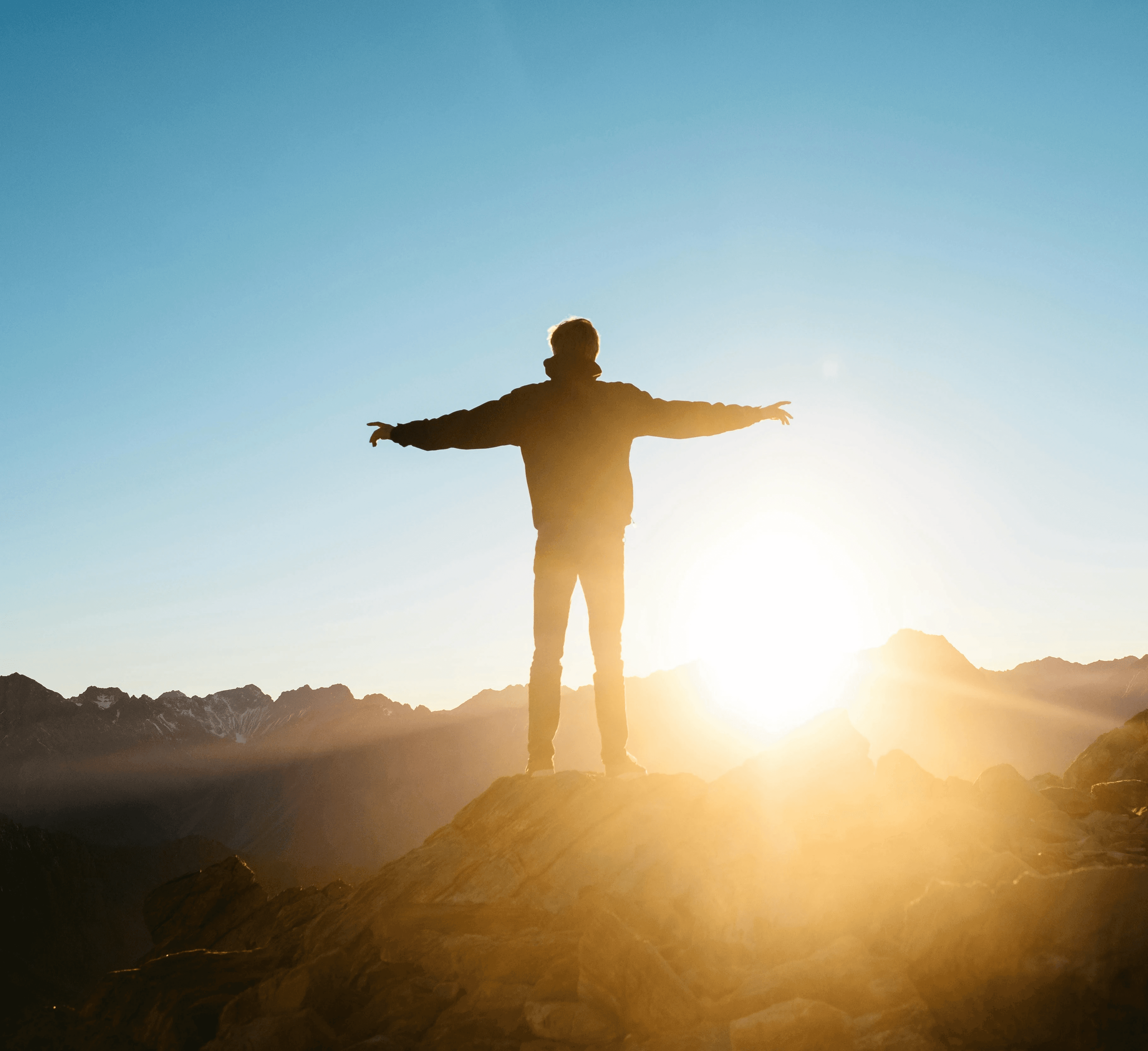 person standing on hill