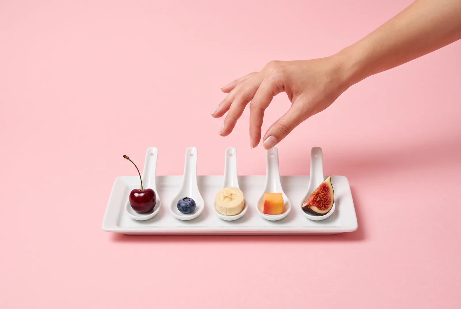 A hand choosing from tasting spoons of different fruit, how to choose the right Fortify alternative for you