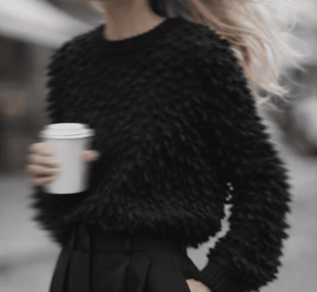 Team working in an office watching at a presentation