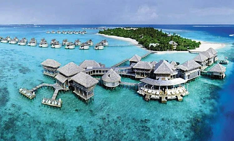 Overwater villas on island lagoon