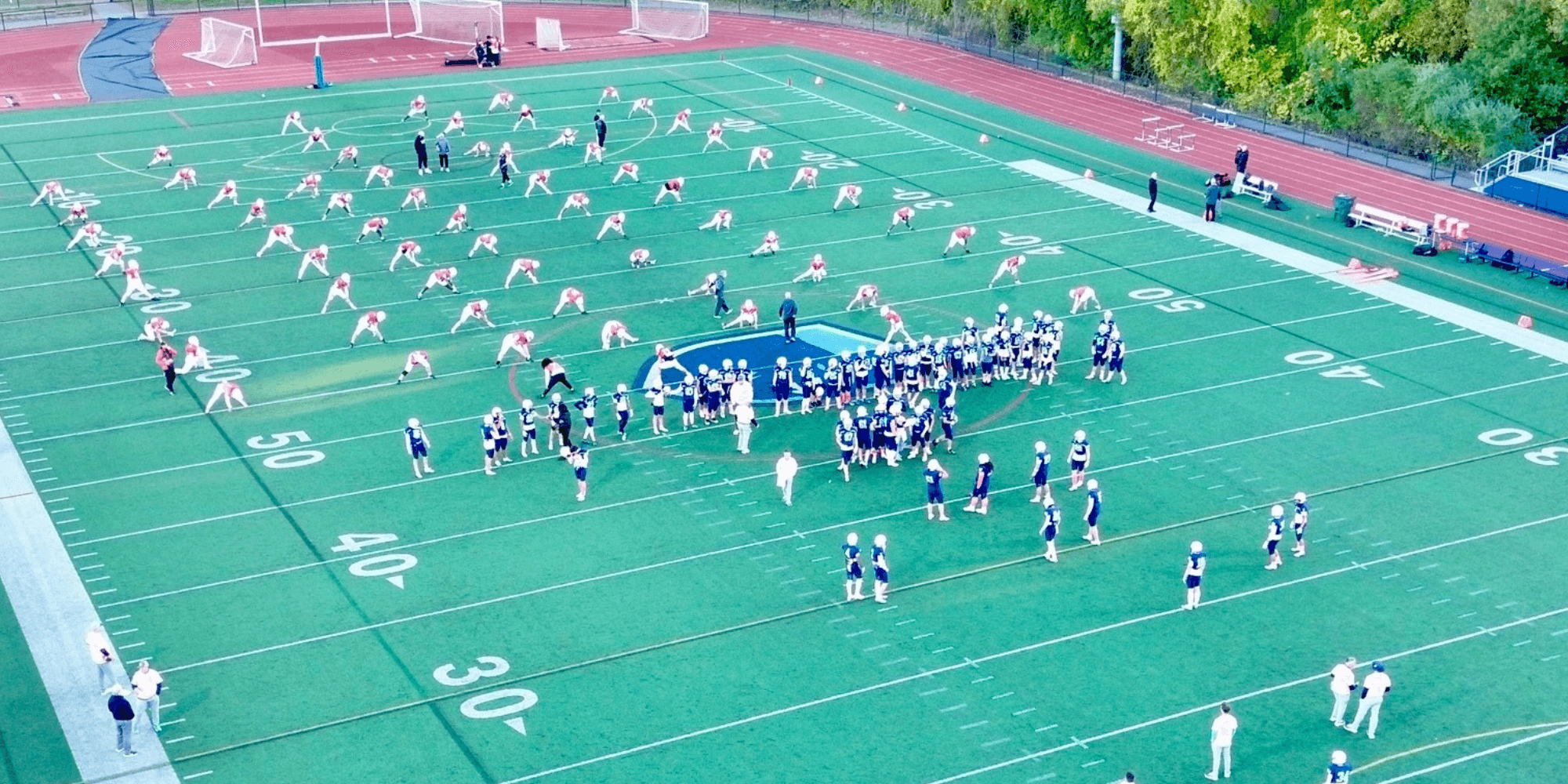 a group of people standing next to each other