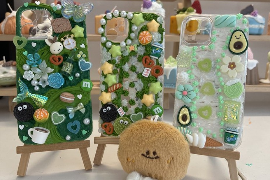 Cream gel art phone case creations from a DIY workshop in London