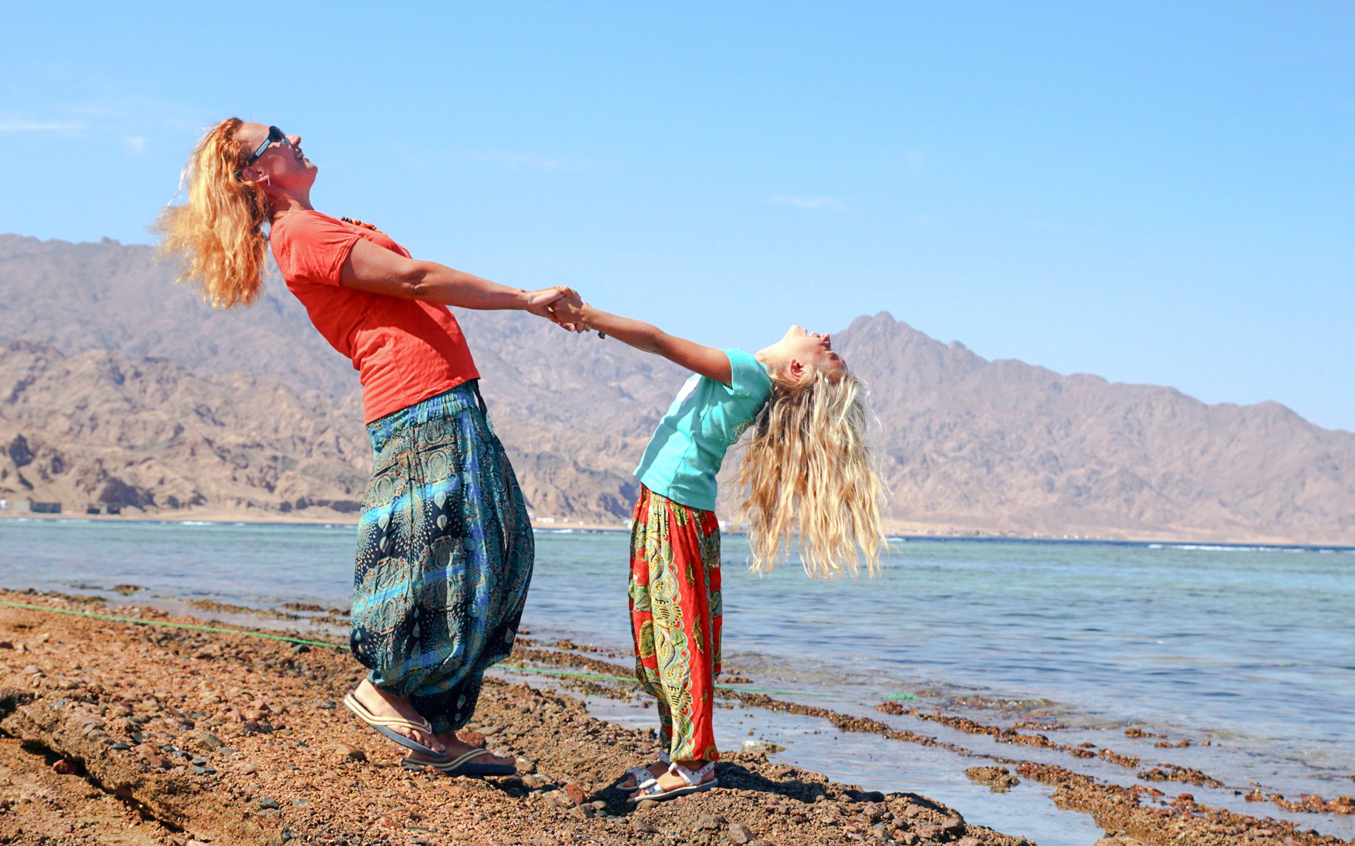 Family enjoying Magic Lake at Ras Muhammad National Park, Egypt.