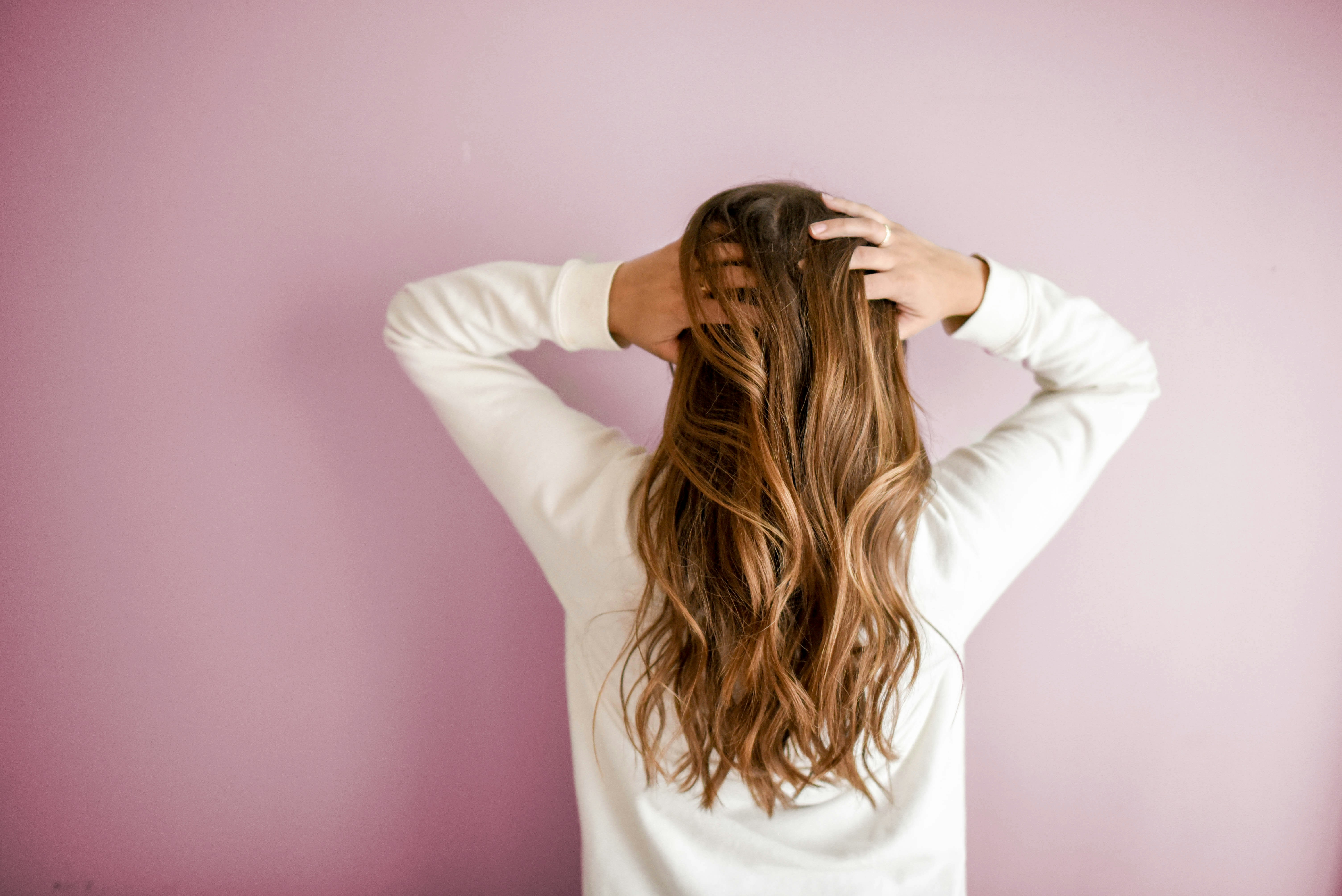 woman showing her hair - hair color analysis