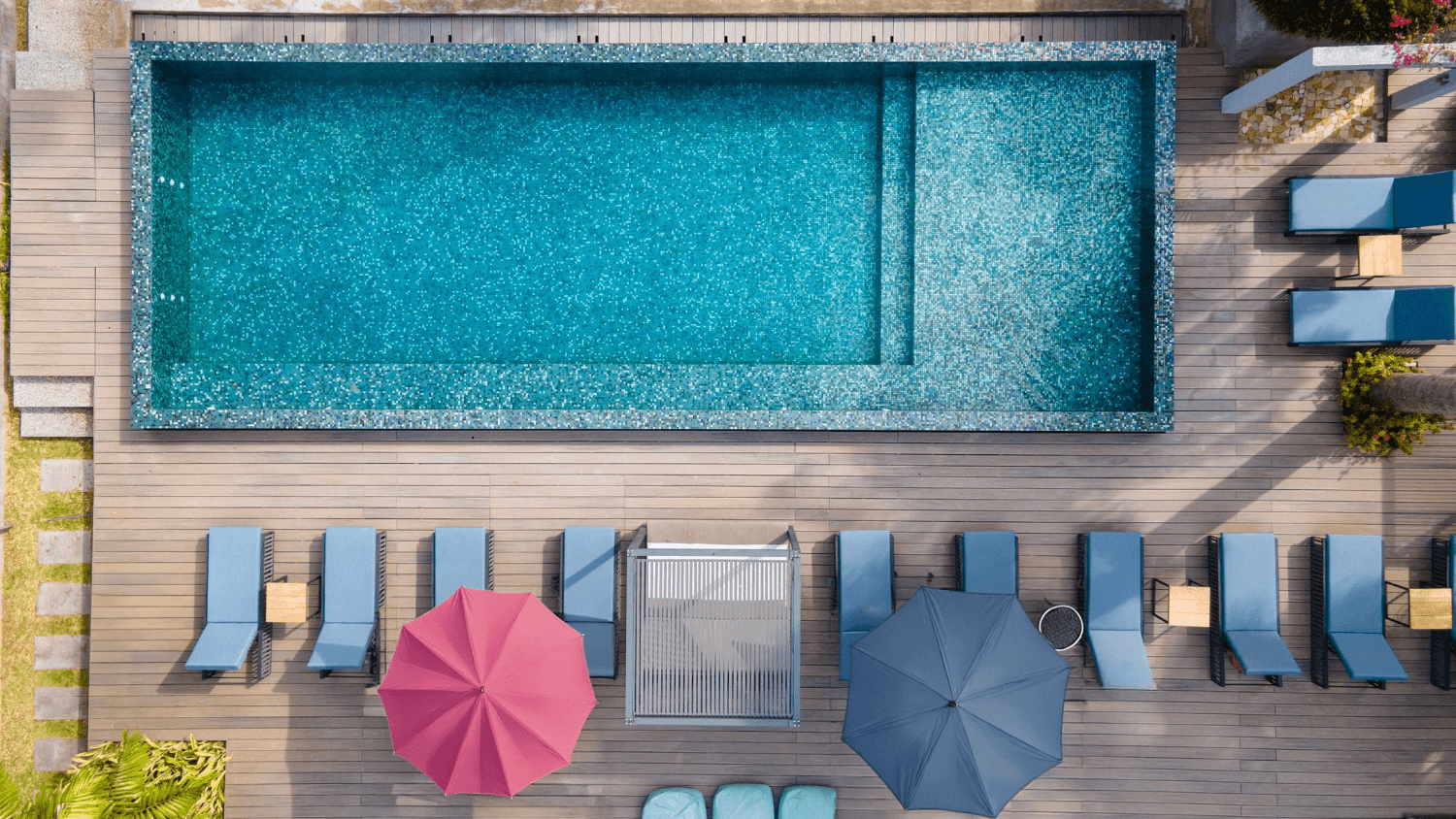 A desktop mockup displays a scenic mountain background with YouTube embedded thumbnails for the Mental Health Today podcast, set on a minimal desk with modern decor.