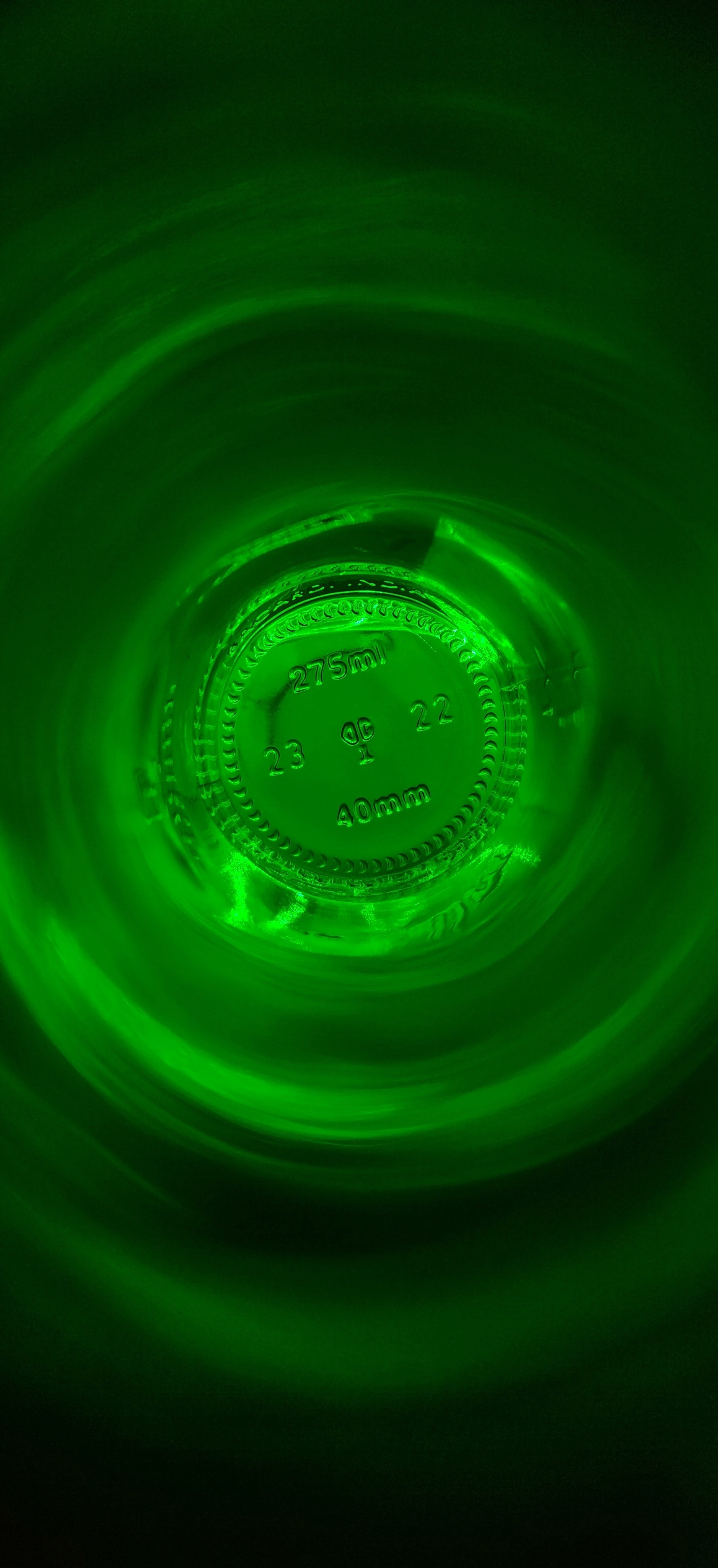 Photo taken from the mouth of a green bottle