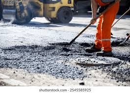 man in black crew neck t-shirt and blue shorts holding woman in white and red