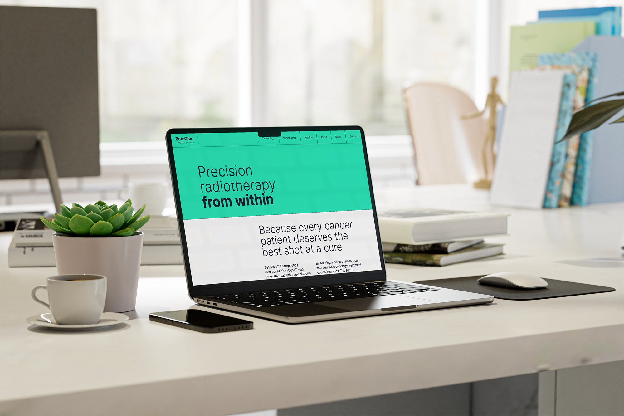 BetaGlue website on a laptop
