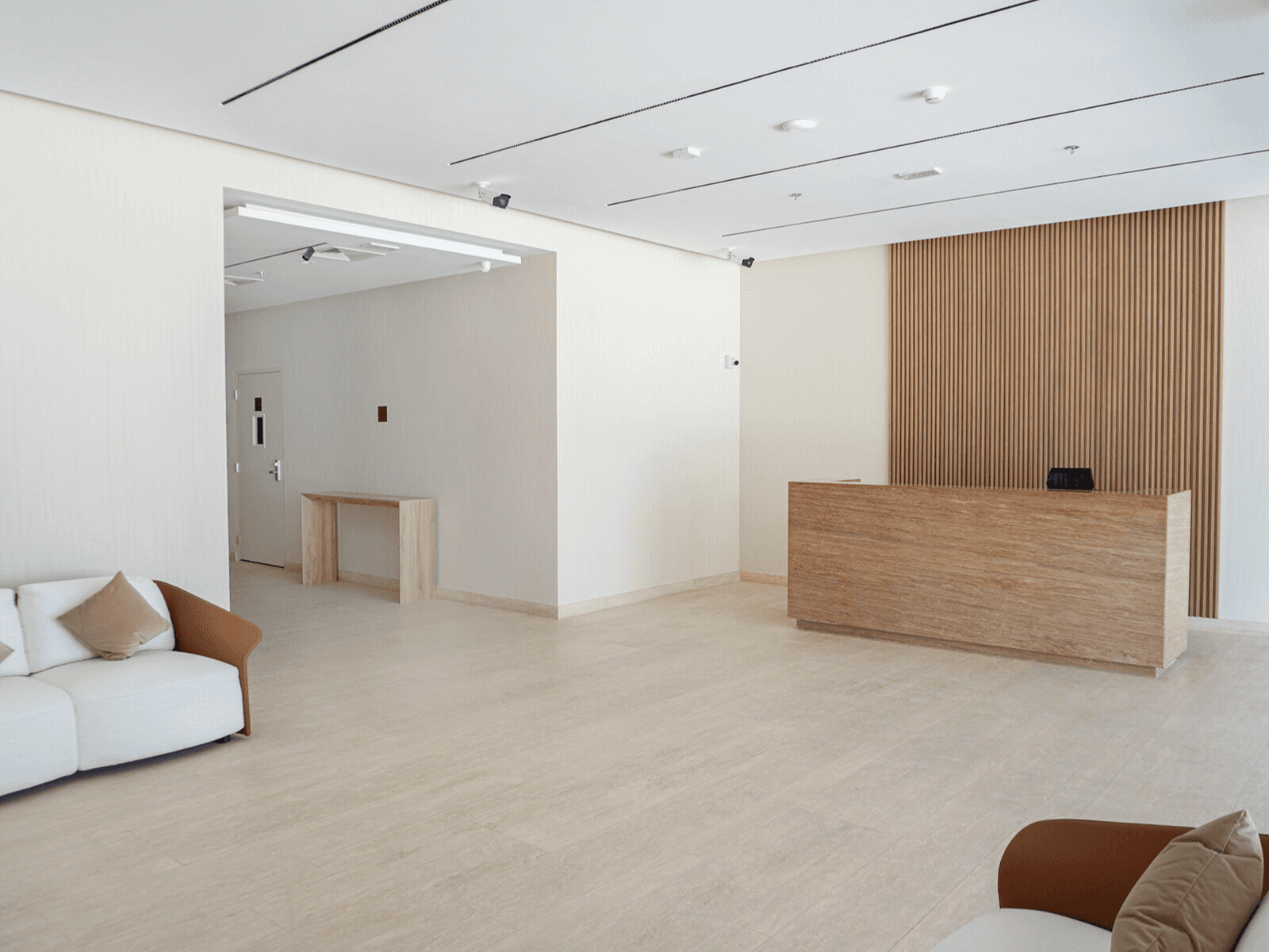 Canal Bay by NED lobby interior with premium finishes and modern luxury design. Explore Dubai properties and buy with crypto through Tylt Real Estate.