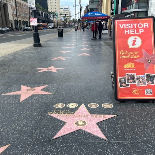 Hollywood Walk of Fame area features a replica star for taking photos, a "Visitor Help" and your own personalized star photo