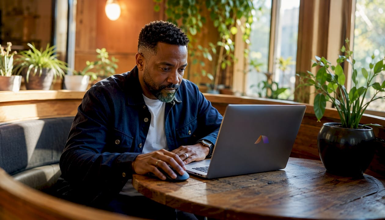 Hiring manager using AI-enabled scheduling laptop