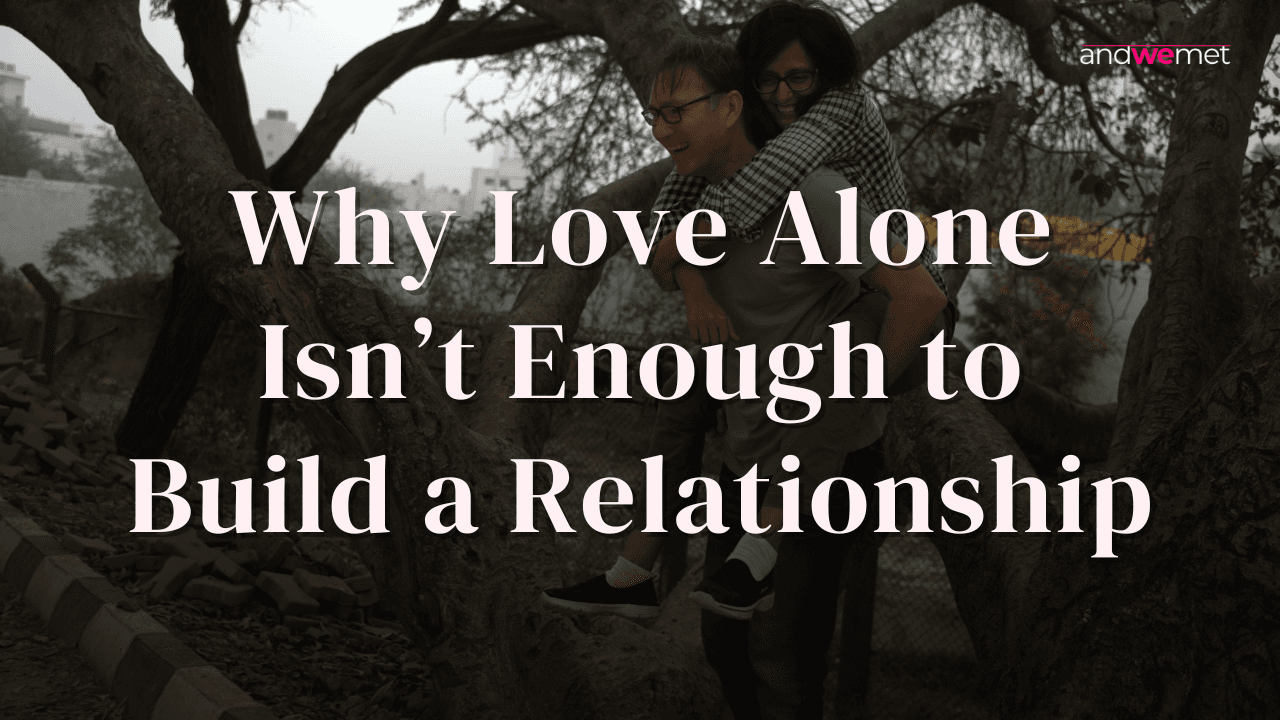 Couple smiling and sharing a playful moment outdoors, symbolizing that love alone is not enough to build a healthy, lasting relationship