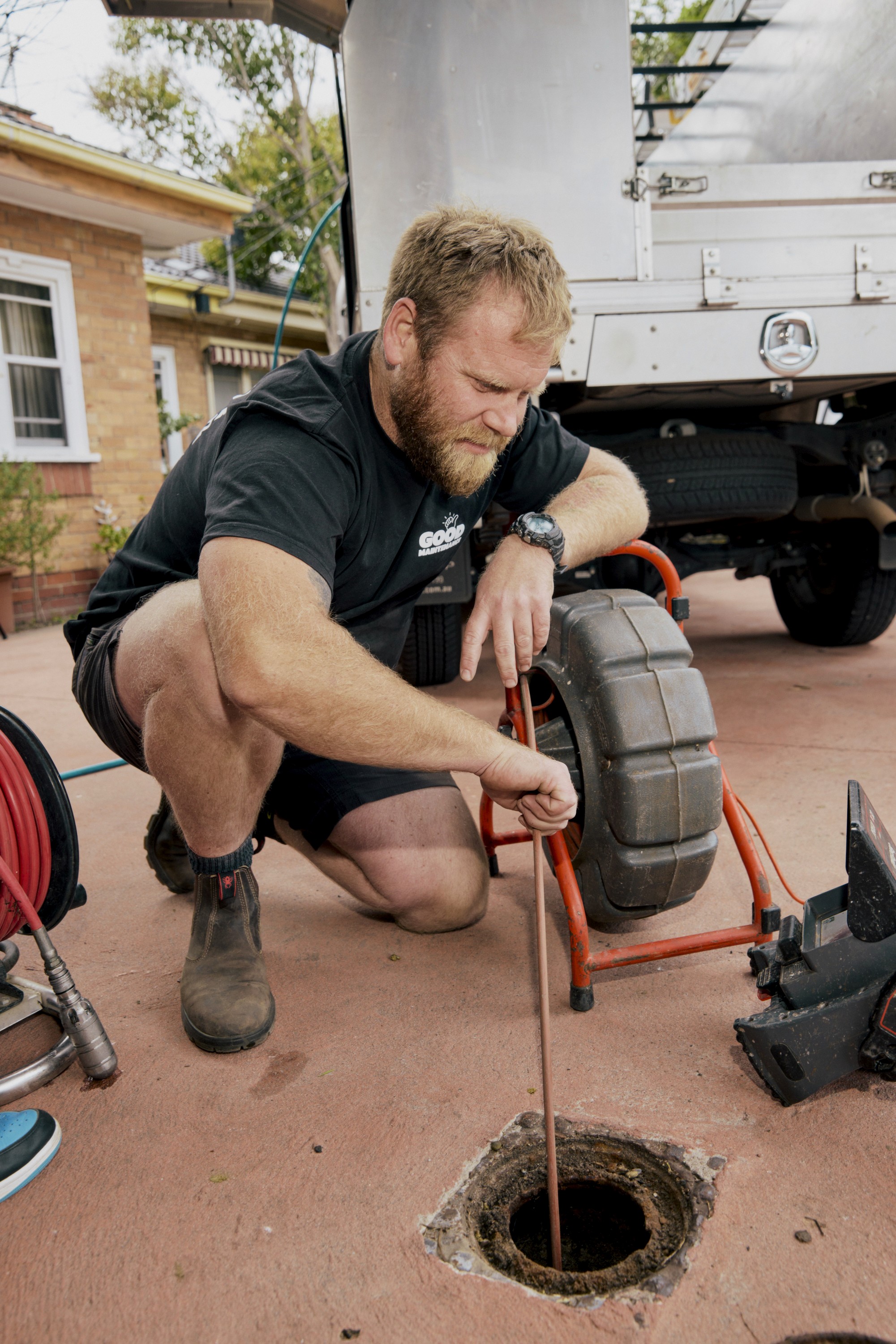 Good Maintenance Plumber Posing Using Drain CCTV