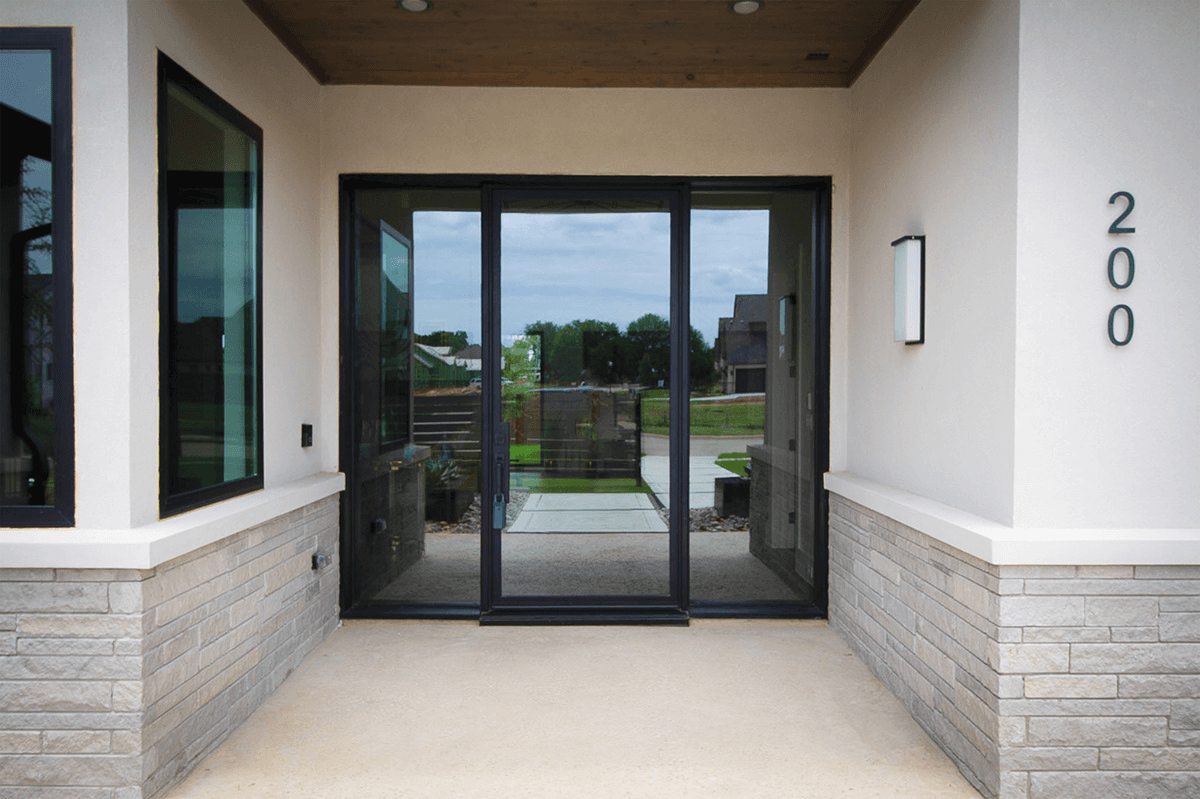 Traditional wrought iron double doors by M2 Metals Iron Doors DFW