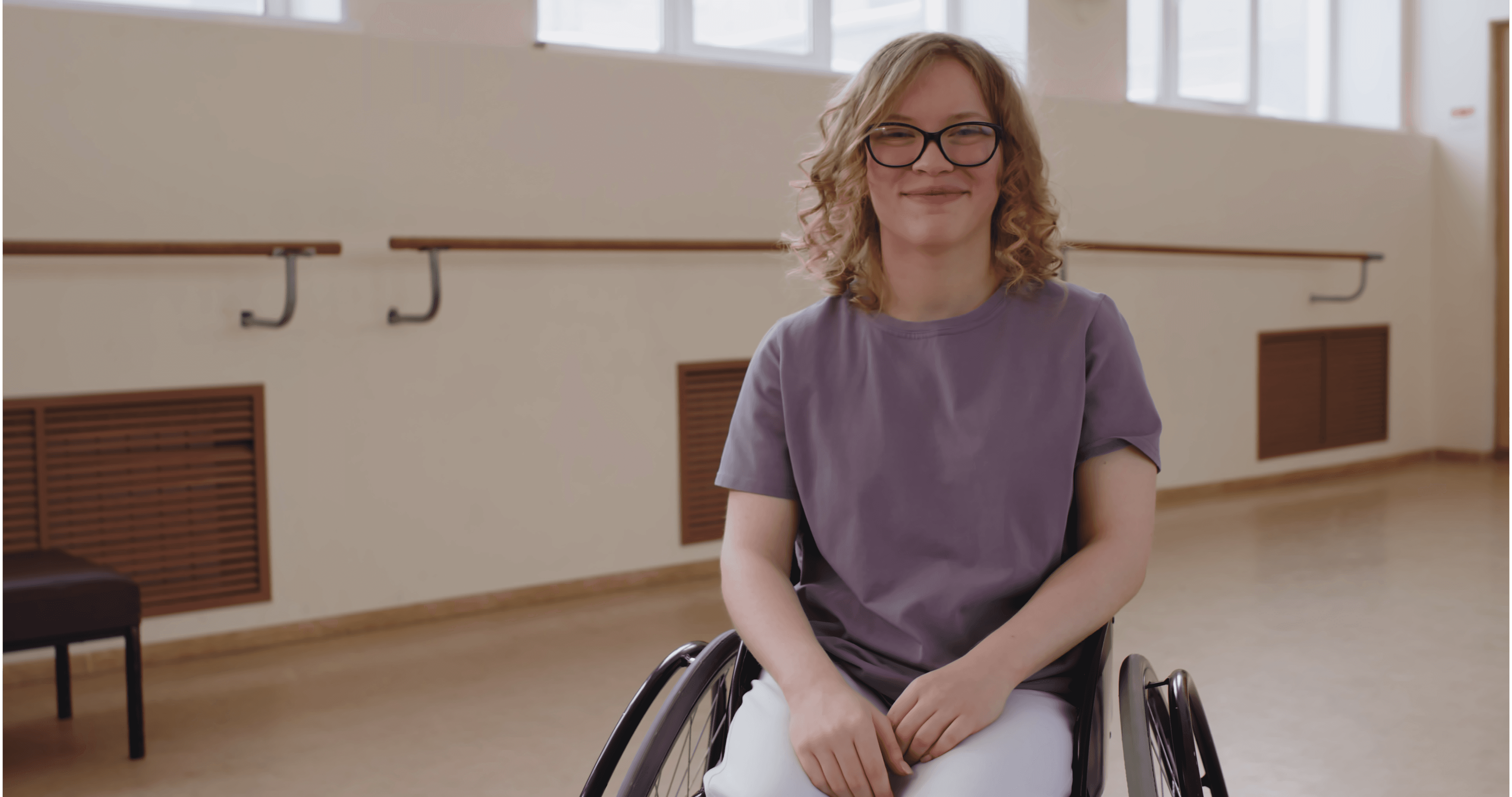 A young women in a wheelchair.