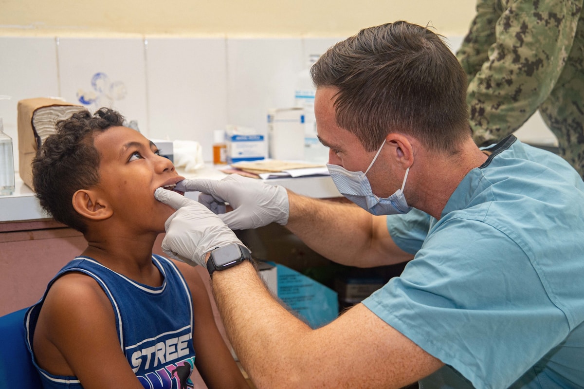 Child smiling during a dental checkup