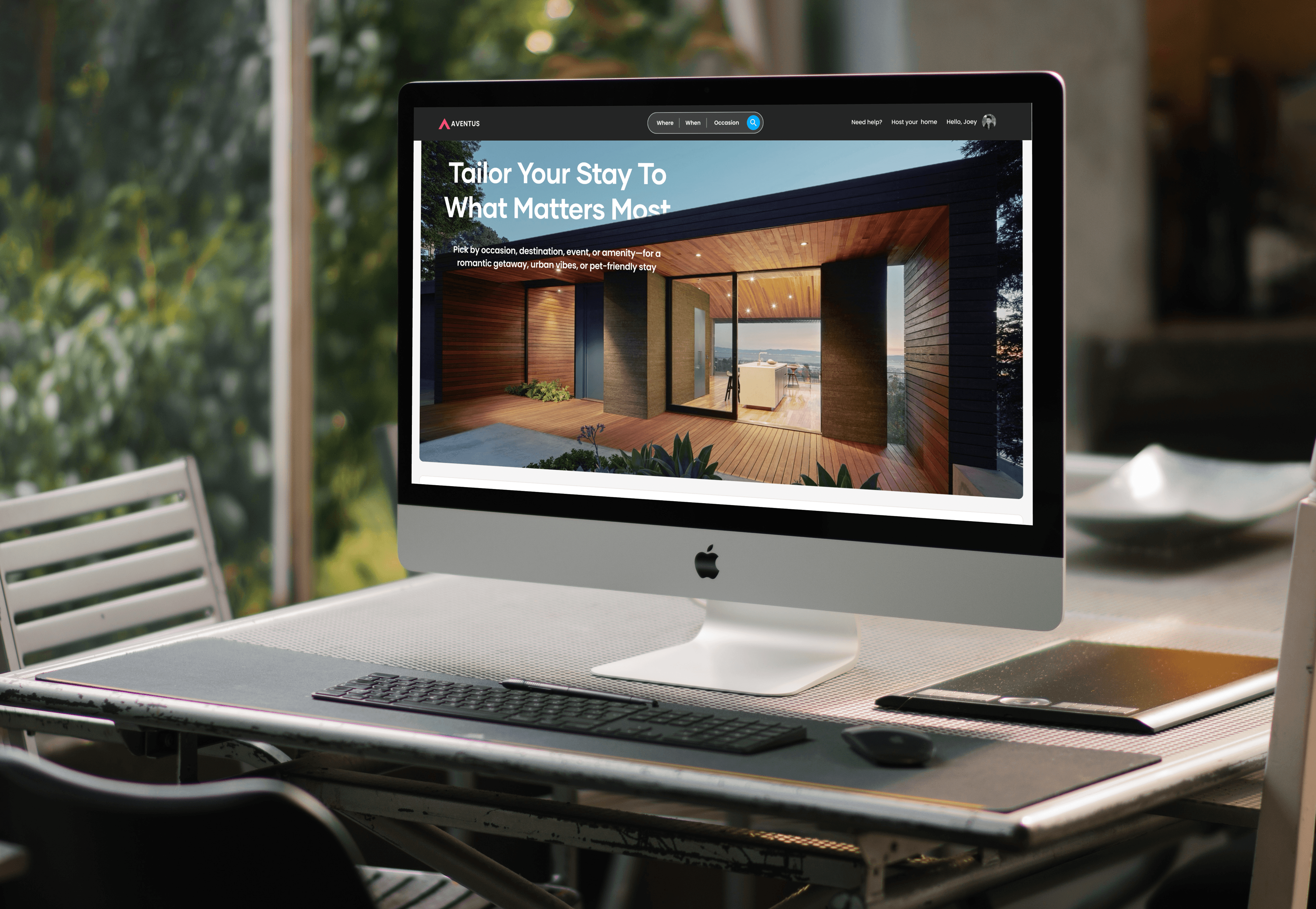 Home office desk with the Aventus website on the iMac