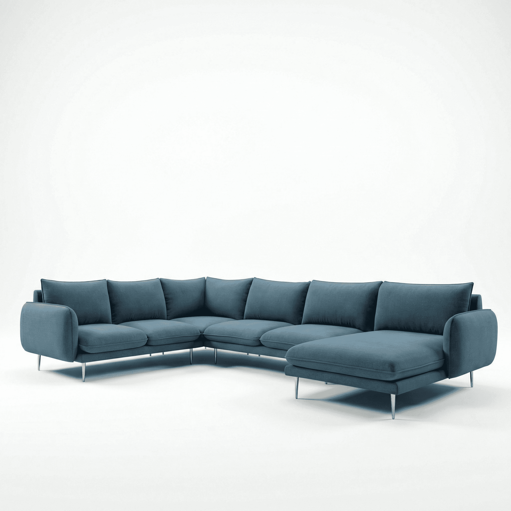 Sleek modern sofa with extended form and architectural living room setting
