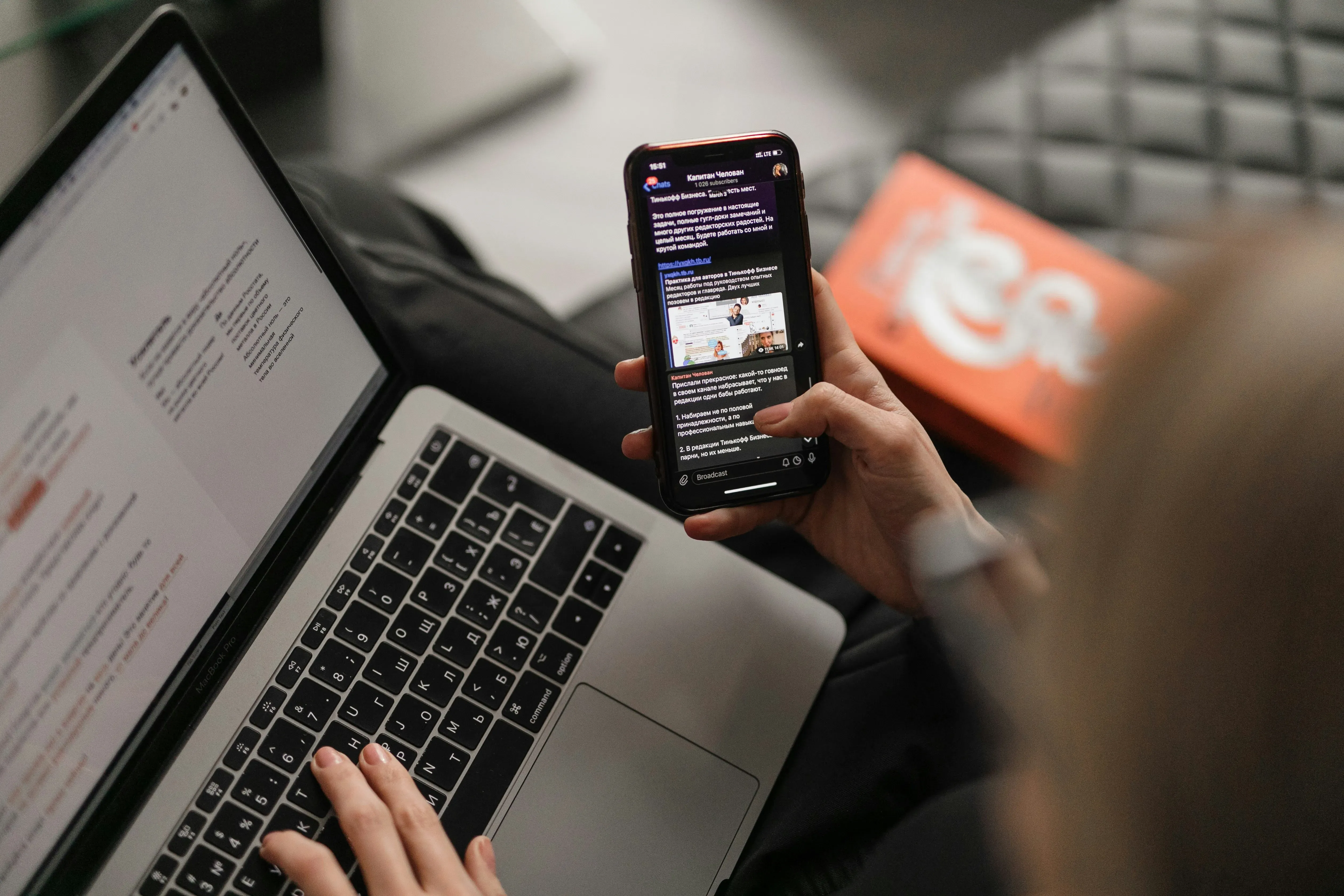 Arsenal website on mobile and laptop