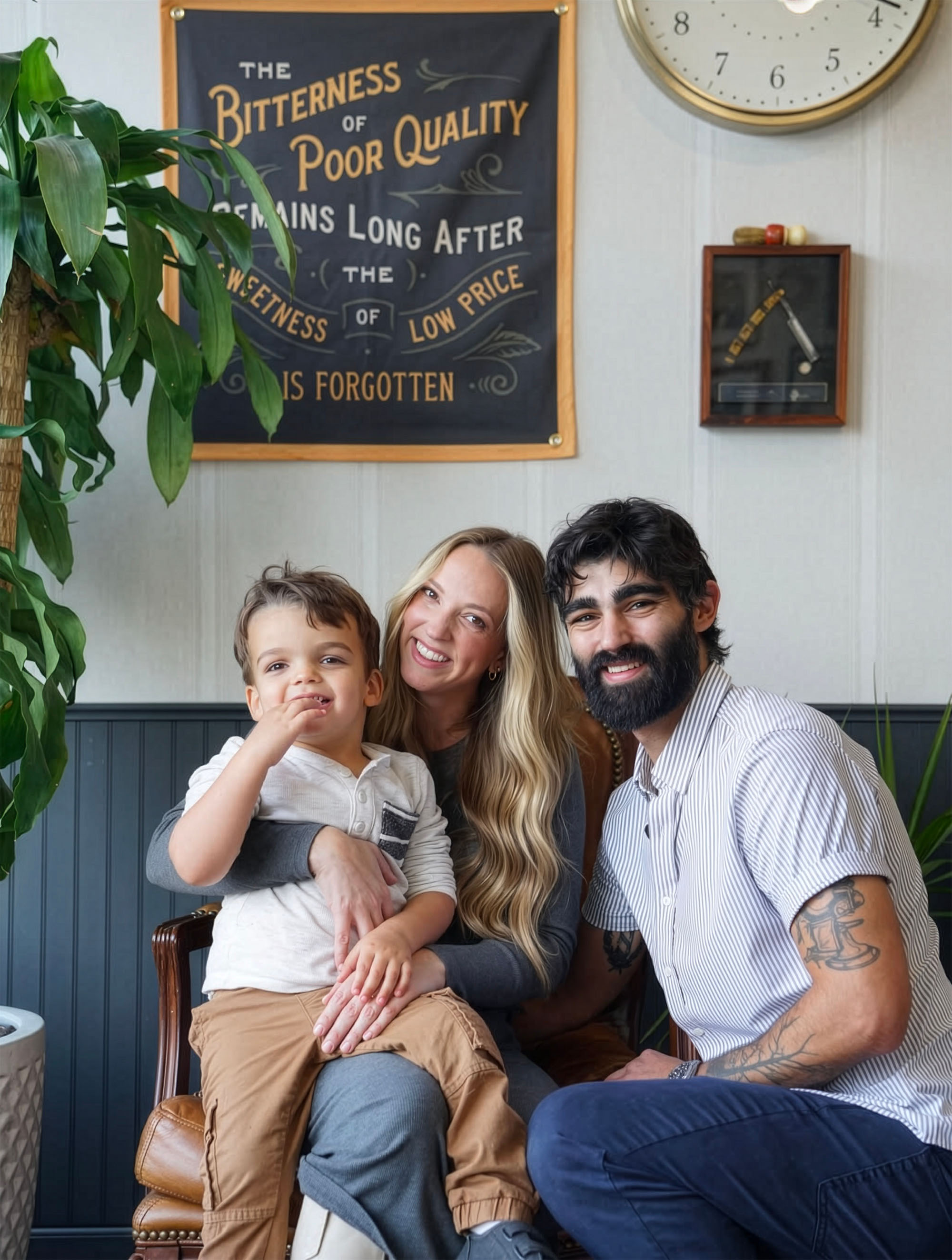 Family portrait of the Calderone family inside Calderone’s Barbershop, reflecting the shop’s family-run roots