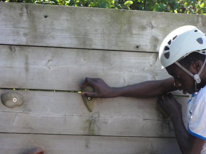 Young person on a climbing wall