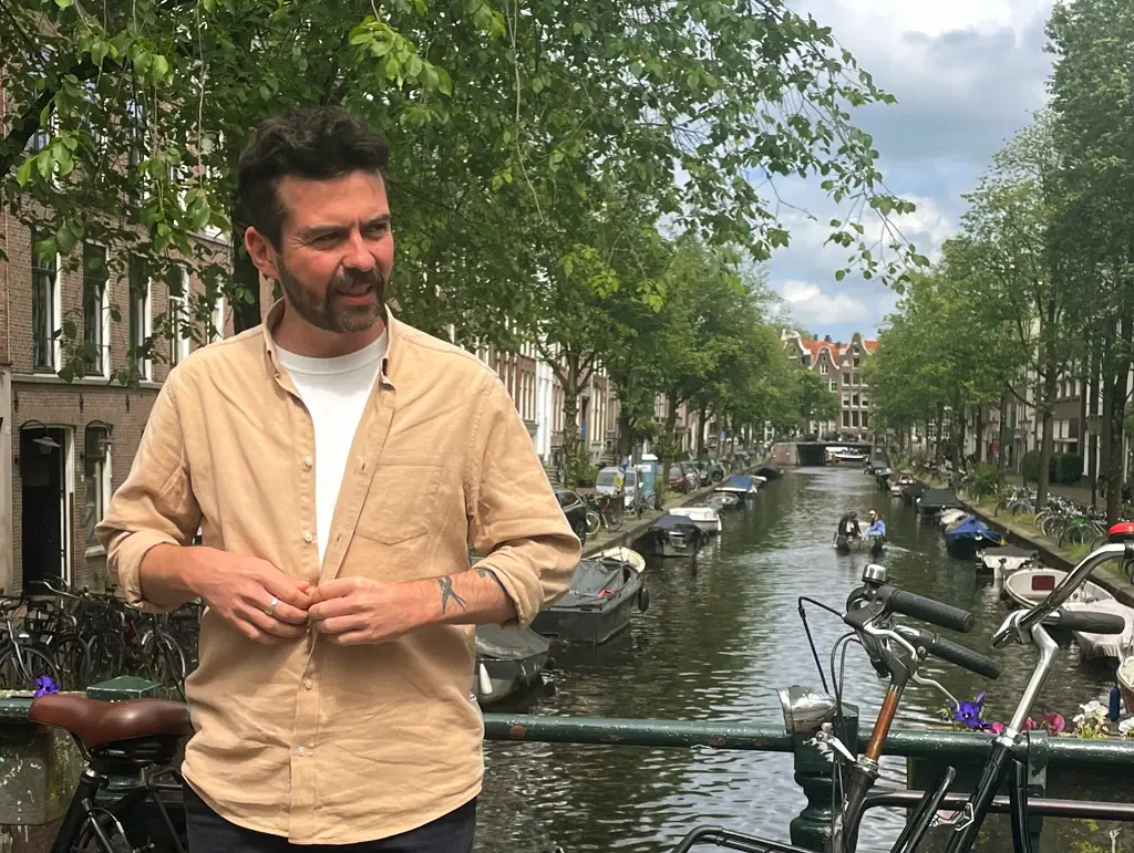Amsterdam canal houses and waterway in historic city center