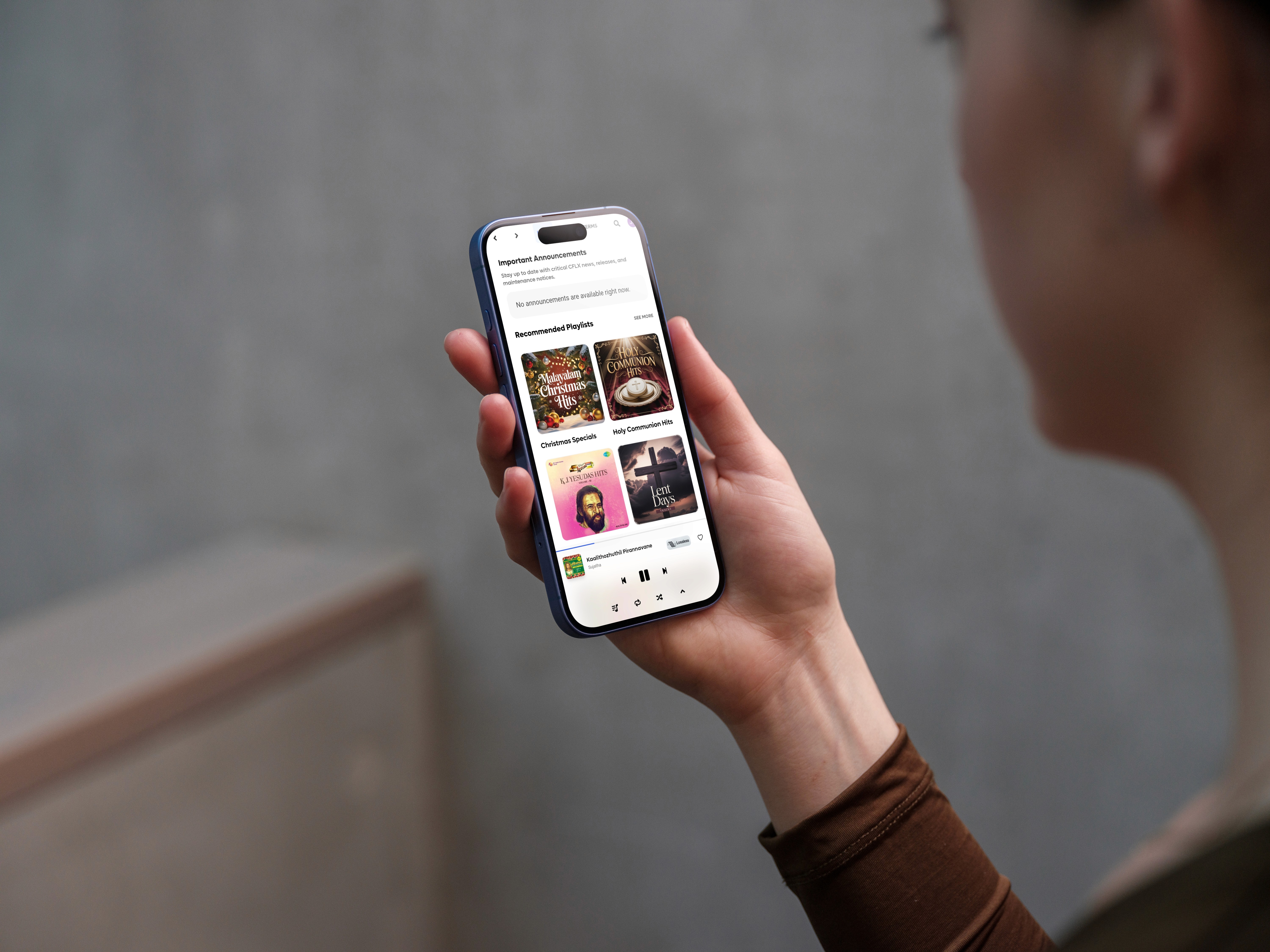a black and white photo of a cross on a hill