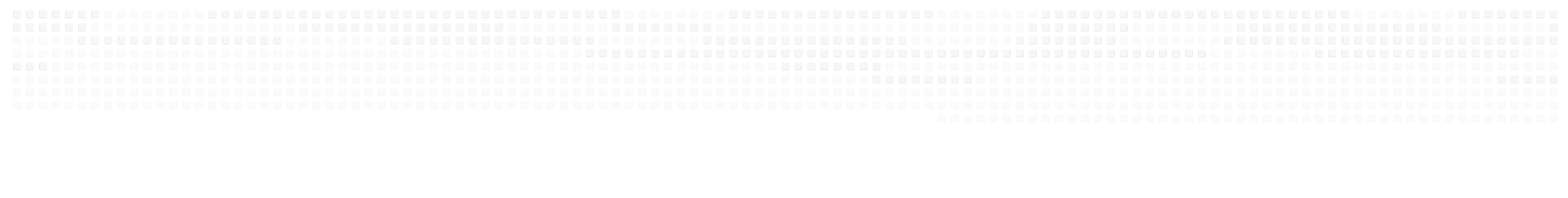 A row of white fence posts supporting a white fence, creating a clean and uniform appearance.