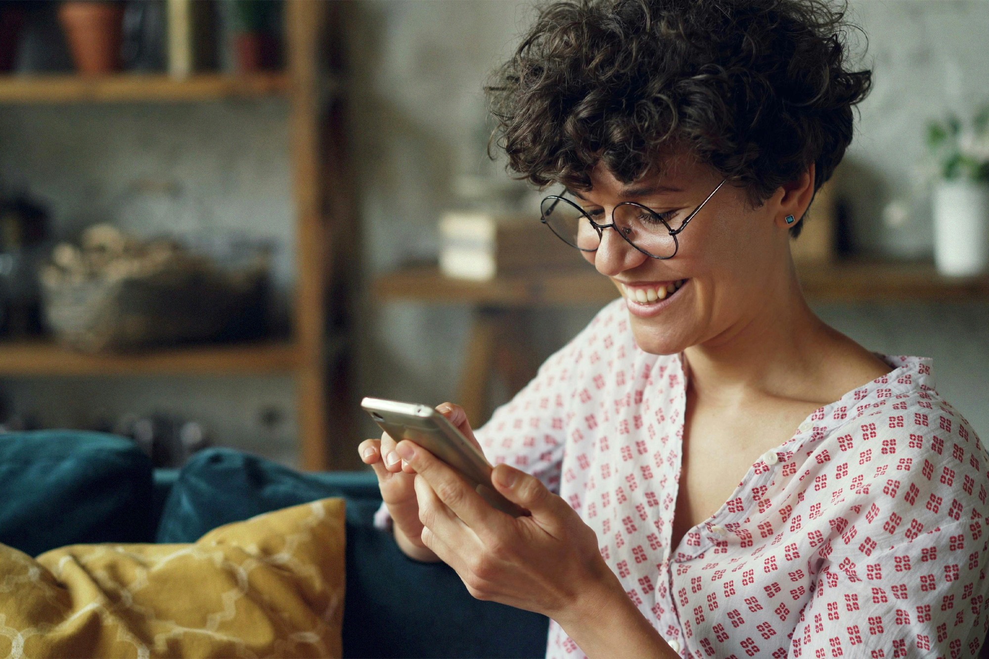 Woman using phone to apply for business funding quickly and easily